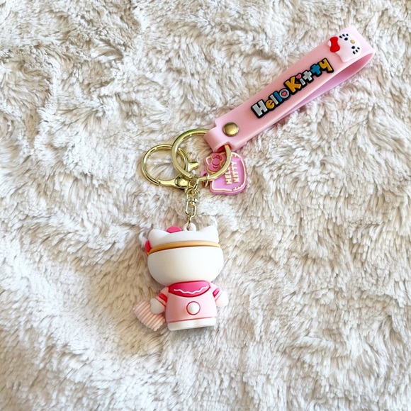 Sanrio Hello Kitty In A Pink Dress & Sleep Mask Keychain Bag Accessory Wristlet - Picture 2 of 2